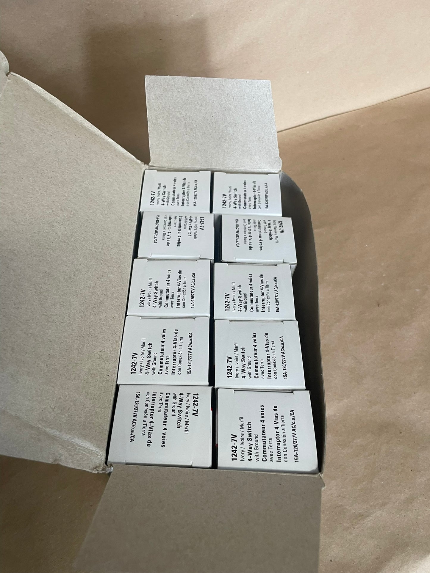 Box of 10 1242-7V Ivory 4 way switch with Ground 15 Amp